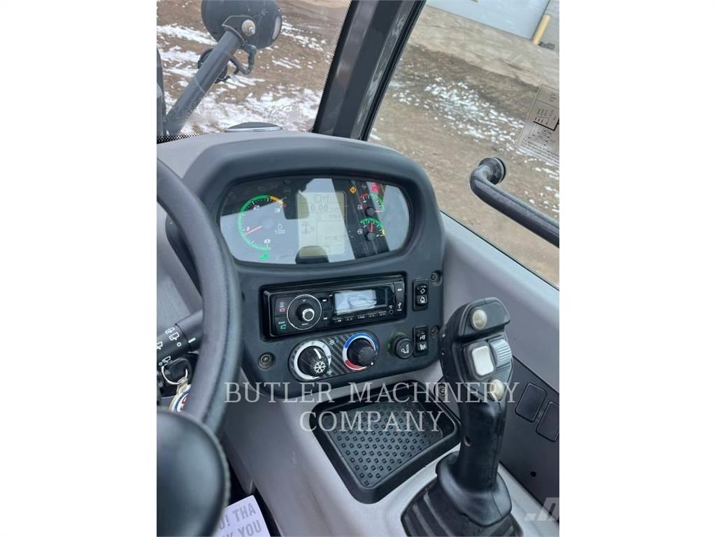 New Holland 321F Naudoti ratiniai krautuvai