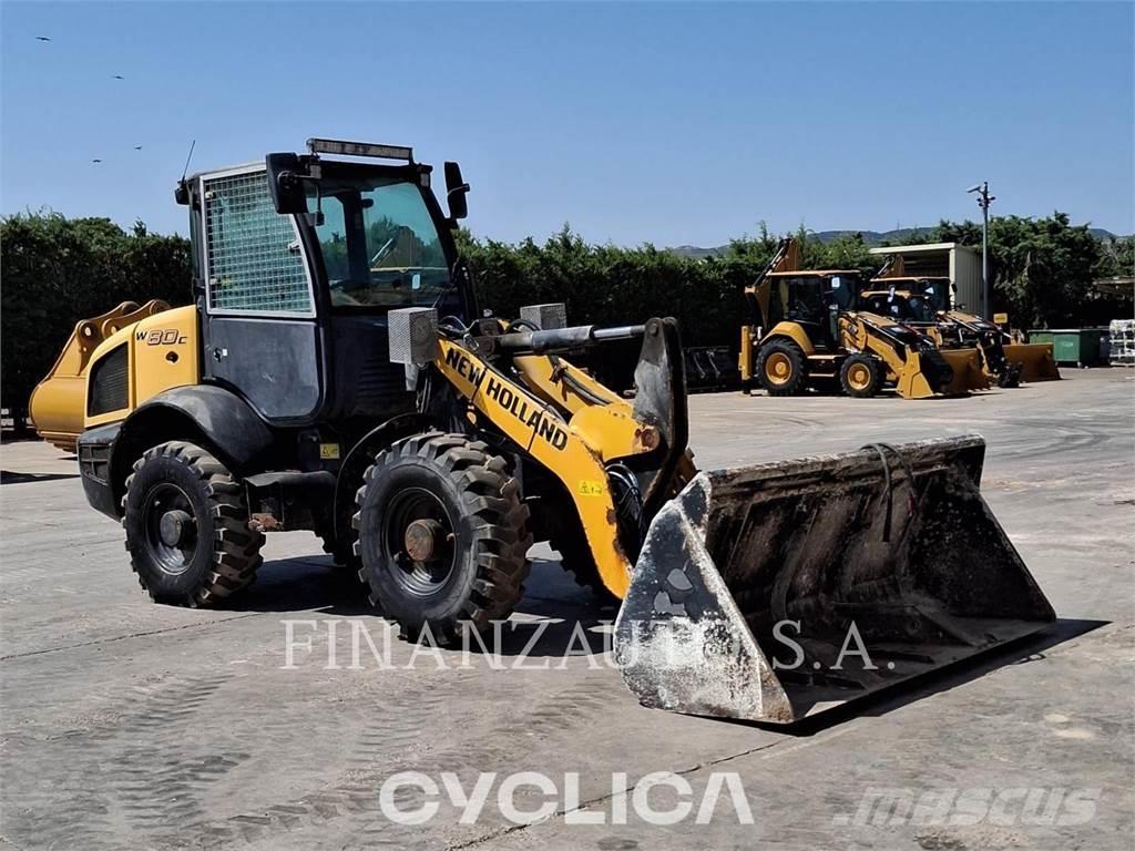 New Holland W80C Naudoti ratiniai krautuvai