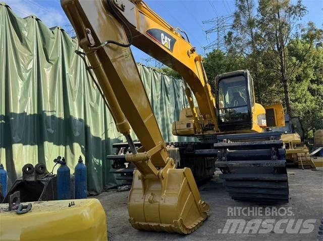 CAT 320 C Amfibiniai ekskavatoriai