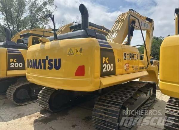 Komatsu PC 200 Vidutinės galios ekskavatoriai 7-12 t