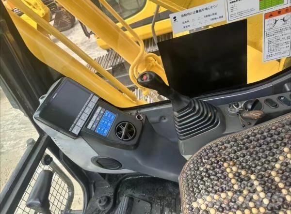 Komatsu PC 200 Vidutinės galios ekskavatoriai 7-12 t
