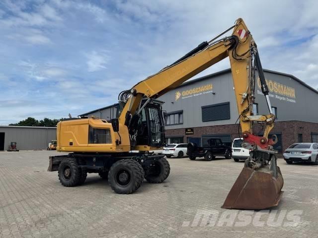 CAT M 318 F Ratiniai ekskavatoriai