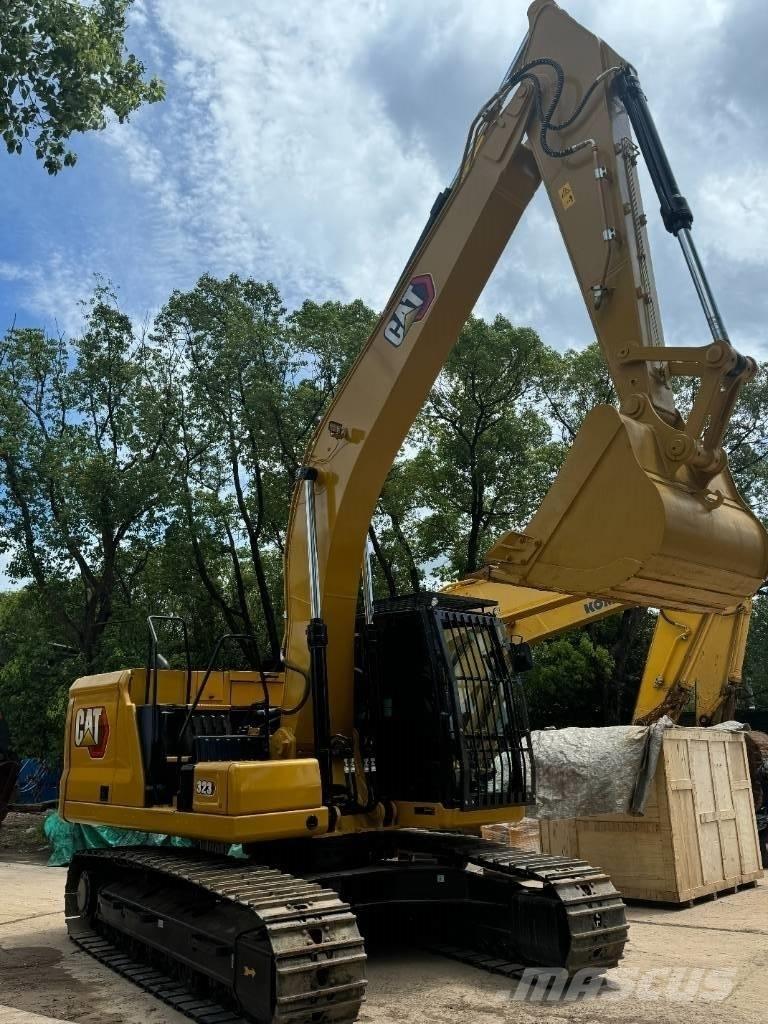 CAT 323 Vidutinės galios ekskavatoriai 7-12 t