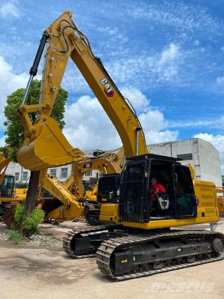 CAT 323 Vidutinės galios ekskavatoriai 7-12 t