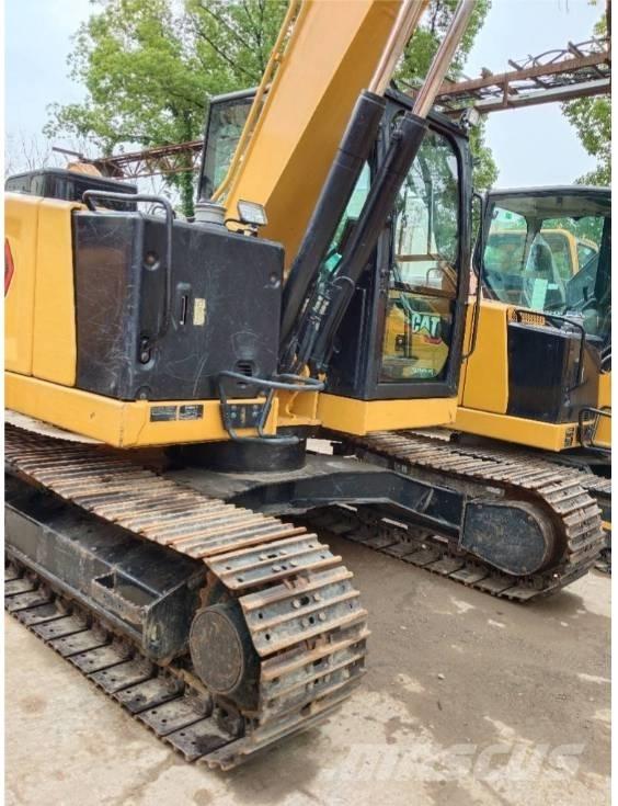 CAT 310 Vikšriniai ekskavatoriai