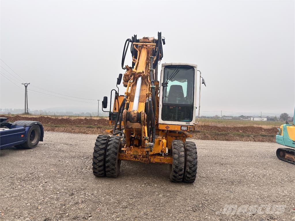 Liebherr A 312 Statyba - Kita