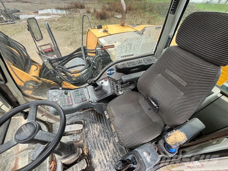 Liebherr A309 Ratiniai ekskavatoriai