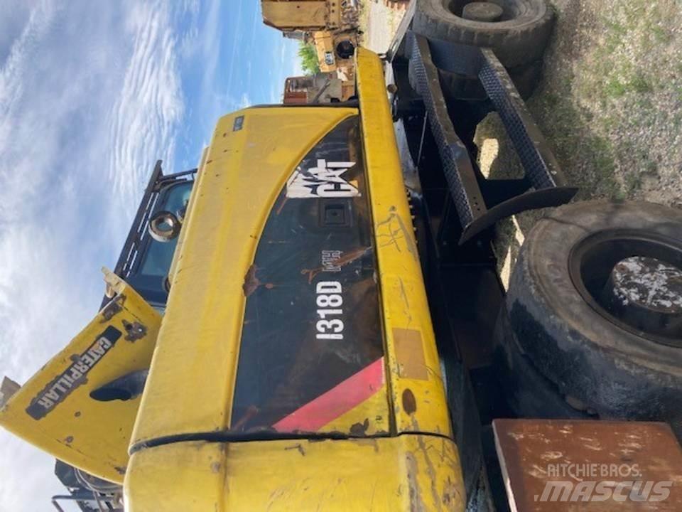 CAT M318D Kabinos ir interjeras