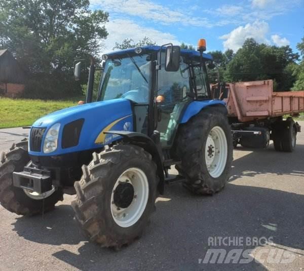 New Holland T5040 Savivartės priekabos