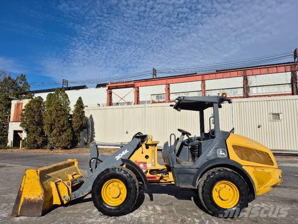 John Deere 204 K Naudoti ratiniai krautuvai