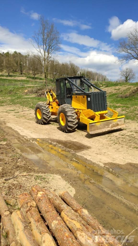 John Deere 640 Skiedrovežiai