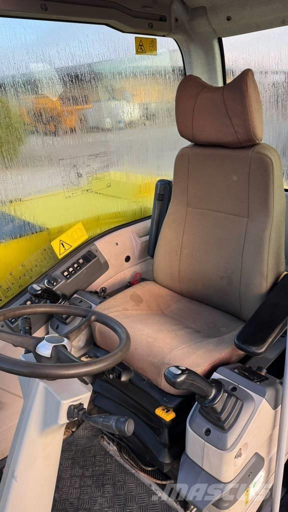 New Holland MH 2.6 Ratiniai ekskavatoriai