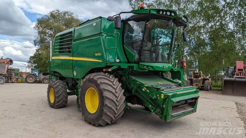 John Deere T 670 i Derliaus nuėmimo kombainai