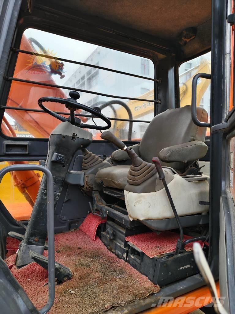 Hitachi EX 100 W D Ratiniai ekskavatoriai