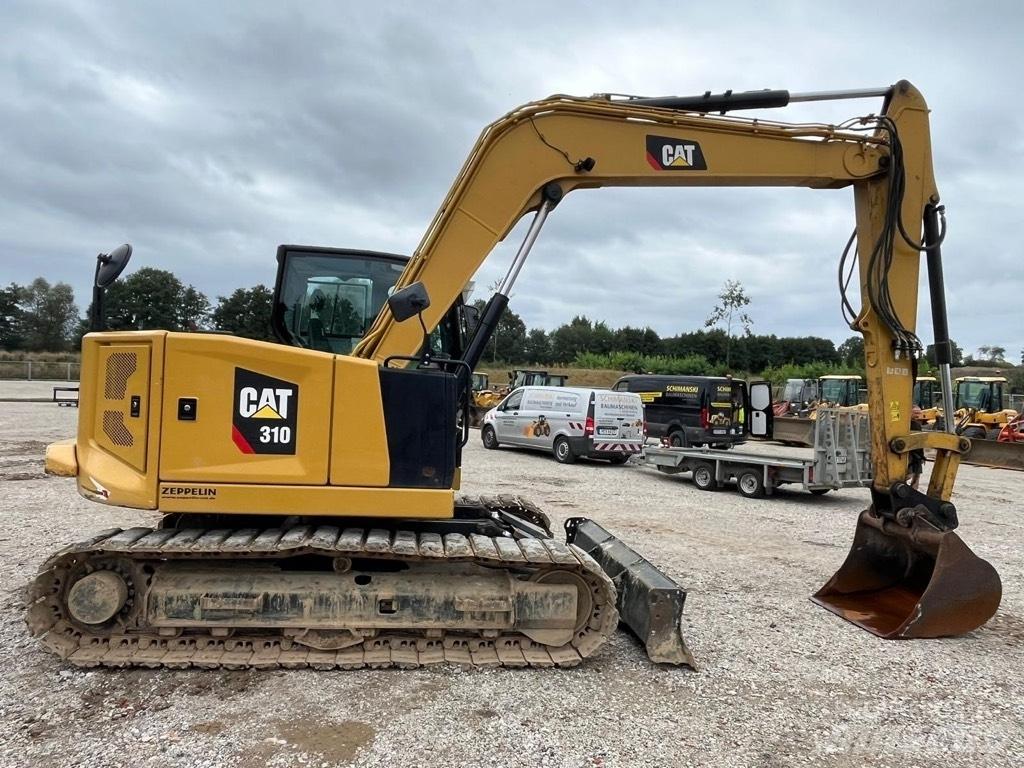 CAT 310 Vidutinės galios ekskavatoriai 7-12 t