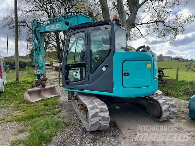 Kobelco SK 75 SR Vidutinės galios ekskavatoriai 7-12 t