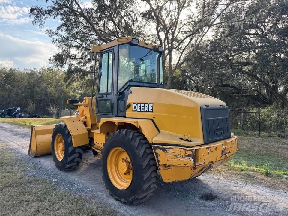John Deere 324h Naudoti ratiniai krautuvai