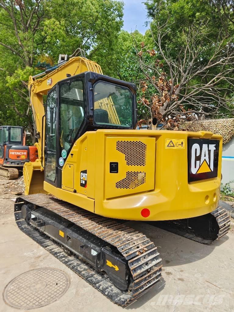 CAT 310 Vikšriniai ekskavatoriai