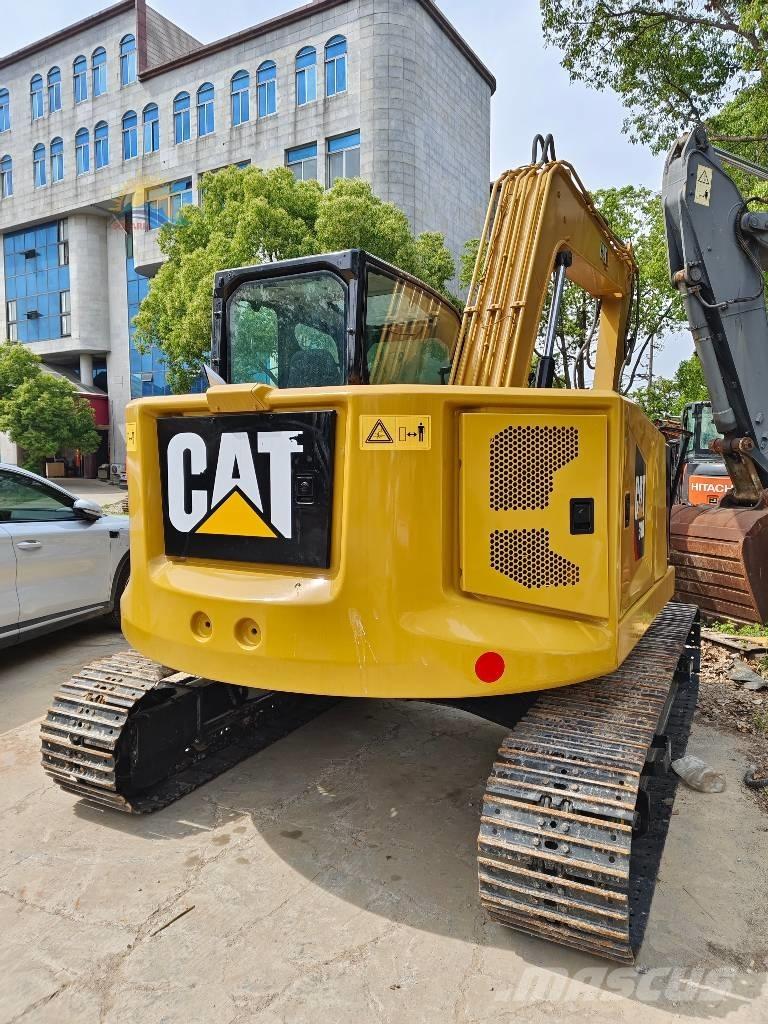 CAT 310 Vikšriniai ekskavatoriai
