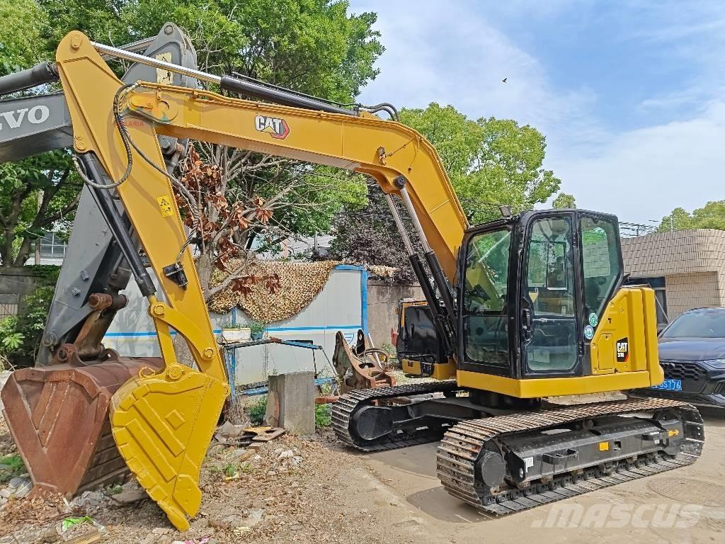 CAT 310 Vikšriniai ekskavatoriai