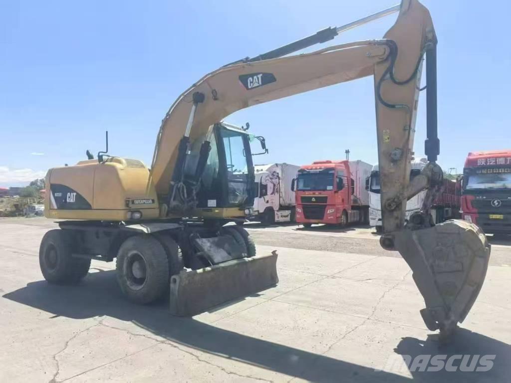 CAT M315D2 Ratiniai ekskavatoriai