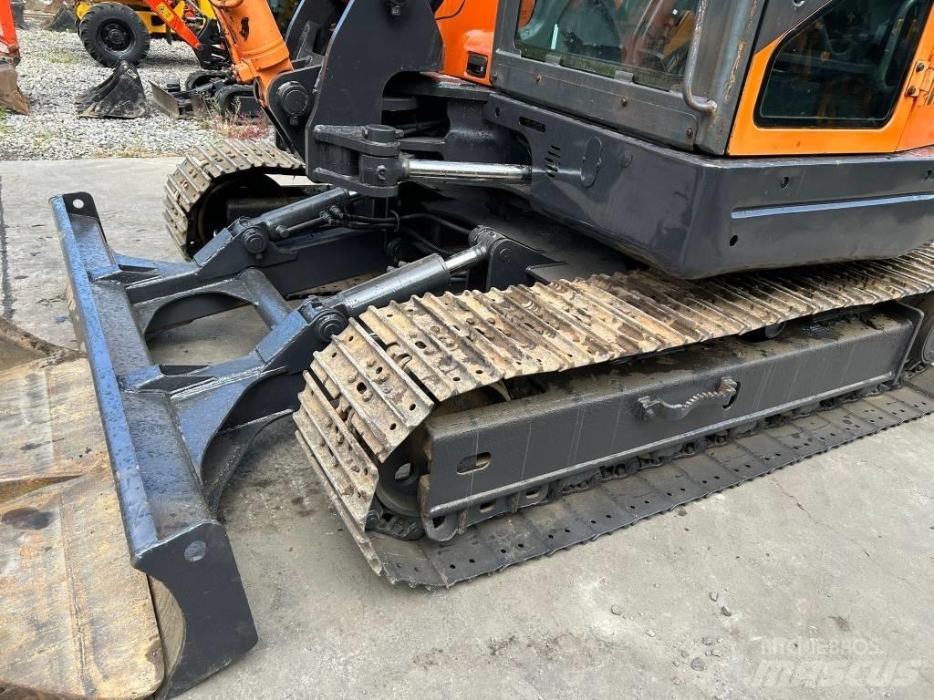 Doosan DX 80 R Vidutinės galios ekskavatoriai 7-12 t
