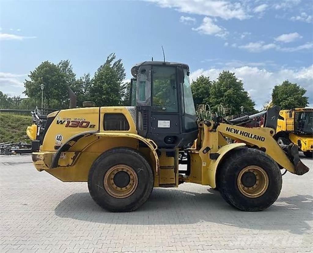New Holland W 130B Naudoti ratiniai krautuvai
