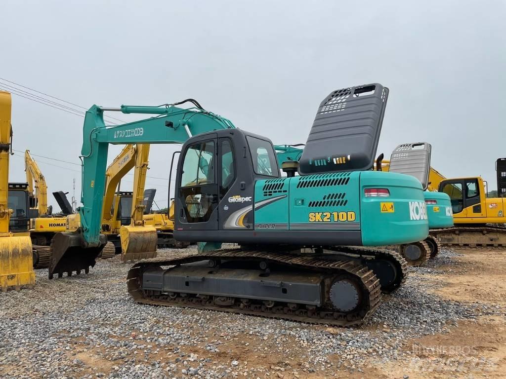 Kobelco SK 210 D Vidutinės galios ekskavatoriai 7-12 t