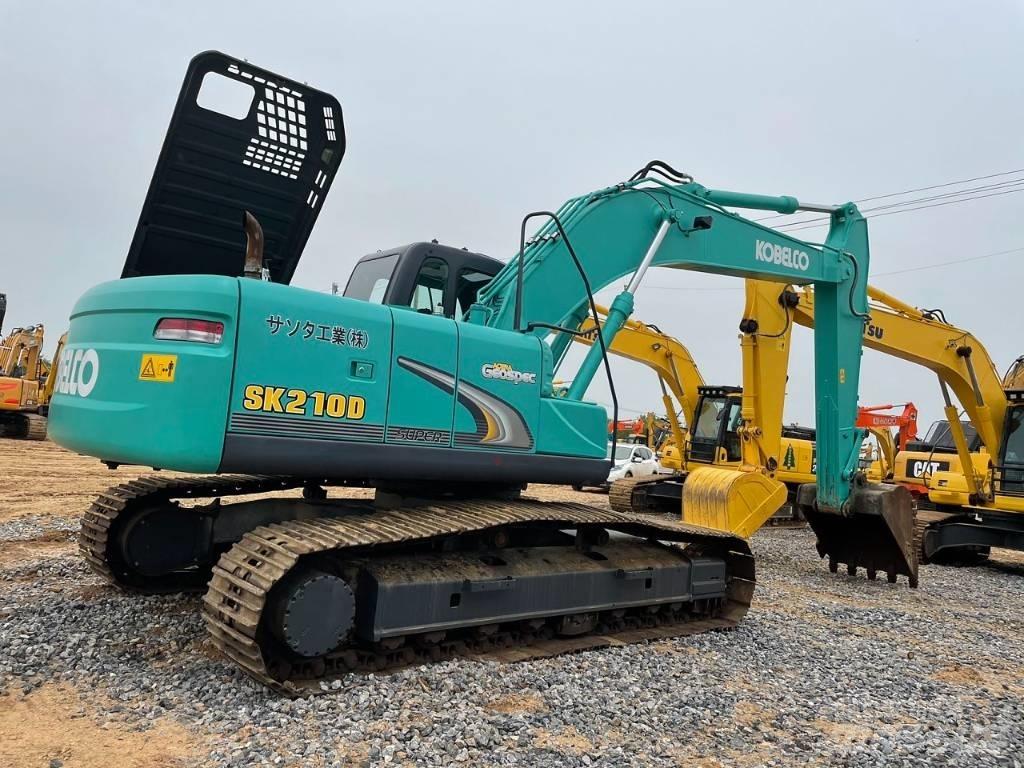 Kobelco SK 210 D Vidutinės galios ekskavatoriai 7-12 t