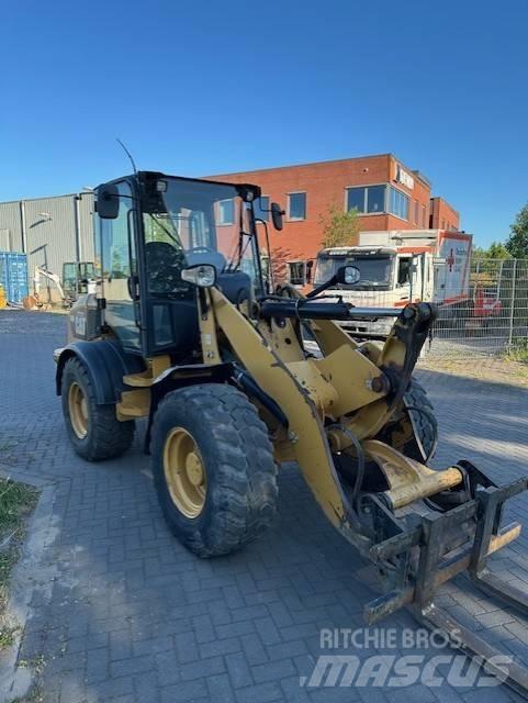 CAT 908 H Naudoti ratiniai krautuvai
