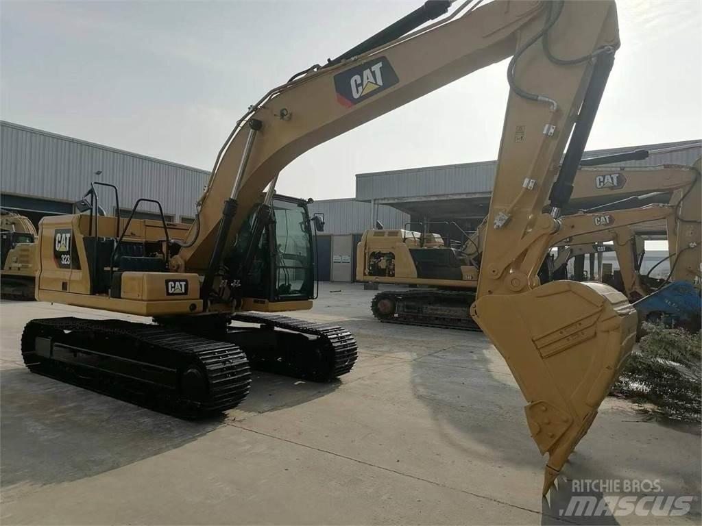 CAT 323 Vikšriniai ekskavatoriai