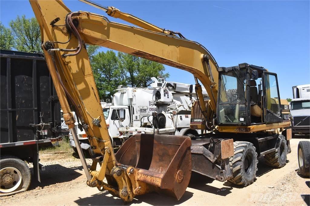CAT M318 Ratiniai ekskavatoriai