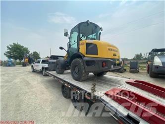New Holland W50C Naudoti ratiniai krautuvai