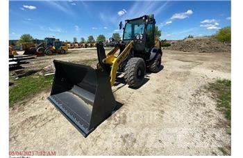 New Holland W80C Naudoti ratiniai krautuvai