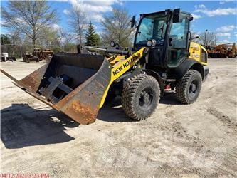 New Holland W80C Naudoti ratiniai krautuvai
