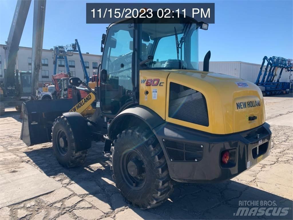 New Holland W80C Naudoti ratiniai krautuvai