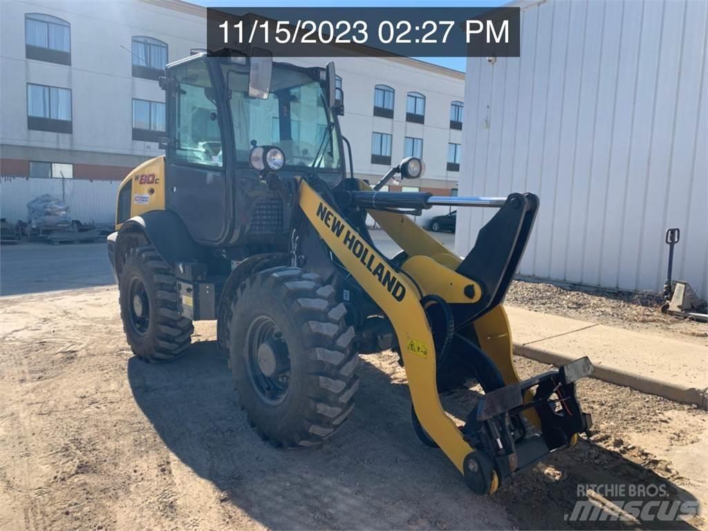 New Holland W80C Naudoti ratiniai krautuvai