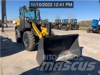 New Holland W80C Naudoti ratiniai krautuvai