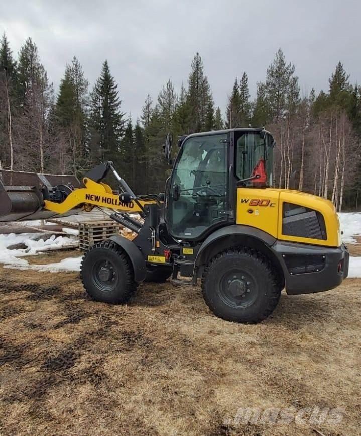 New Holland W80C Naudoti ratiniai krautuvai