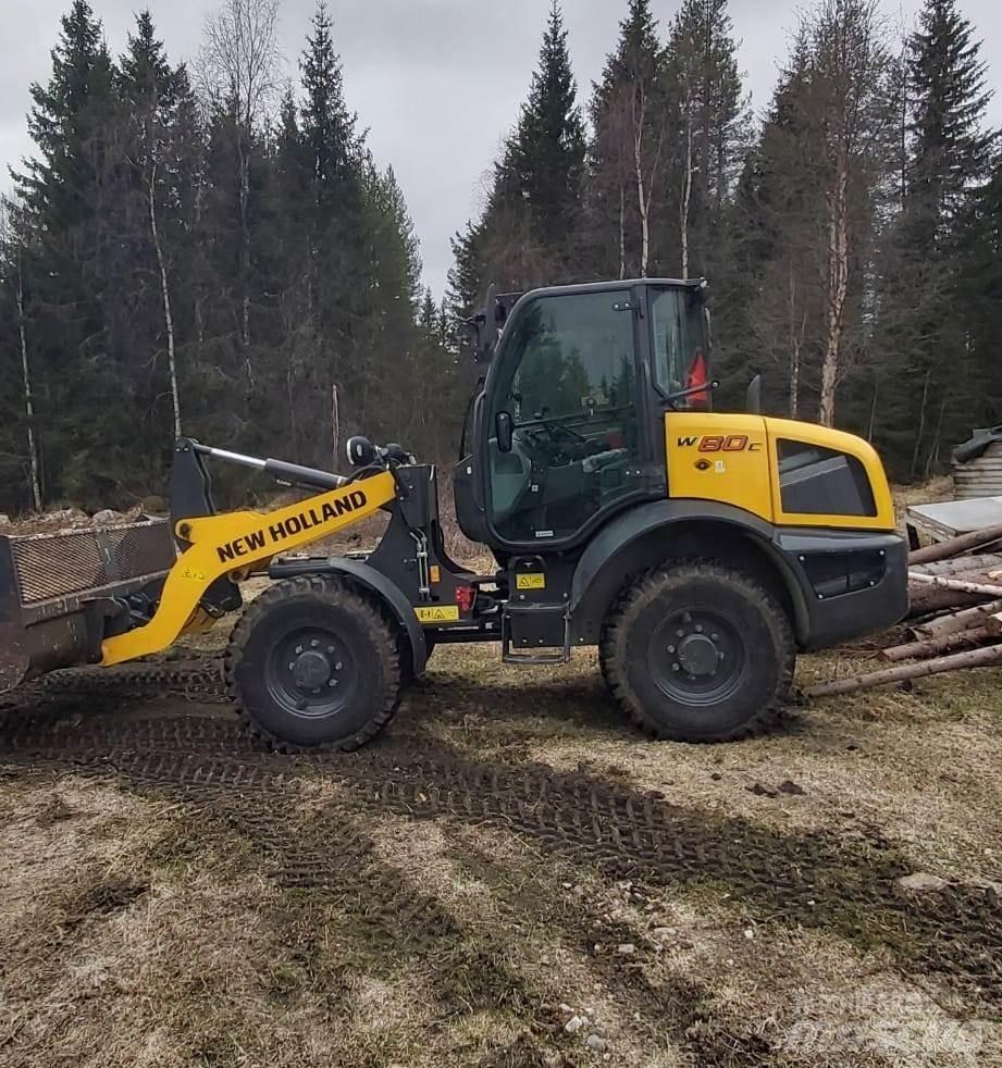 New Holland W80C Naudoti ratiniai krautuvai