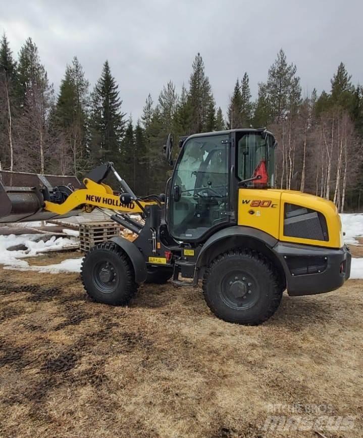 New Holland W80C Naudoti ratiniai krautuvai
