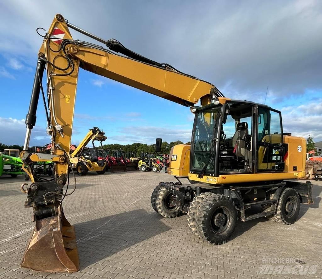 CAT M 318 F Ratiniai ekskavatoriai