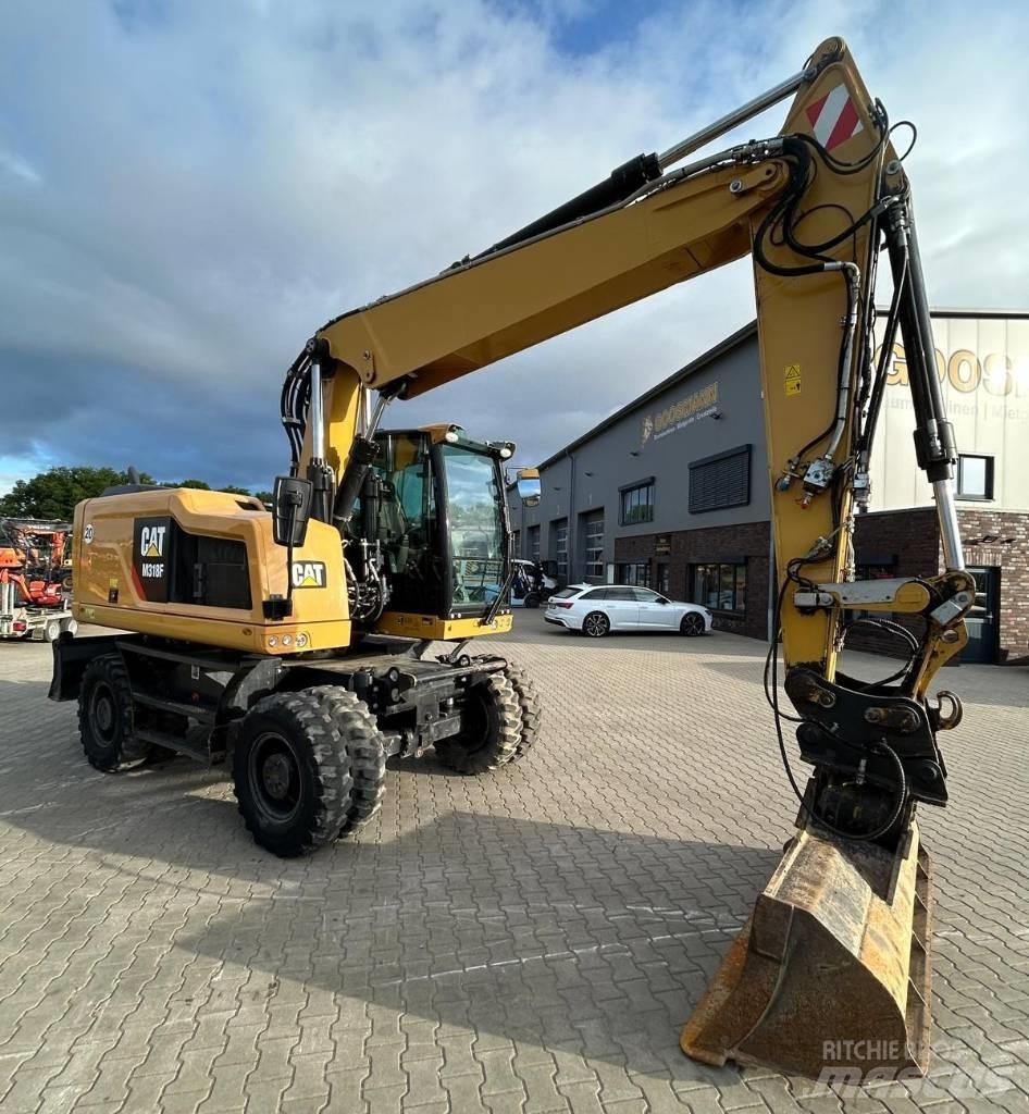 CAT M 318 F Ratiniai ekskavatoriai