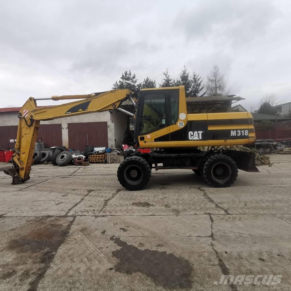 CAT M 318 B Ratiniai ekskavatoriai