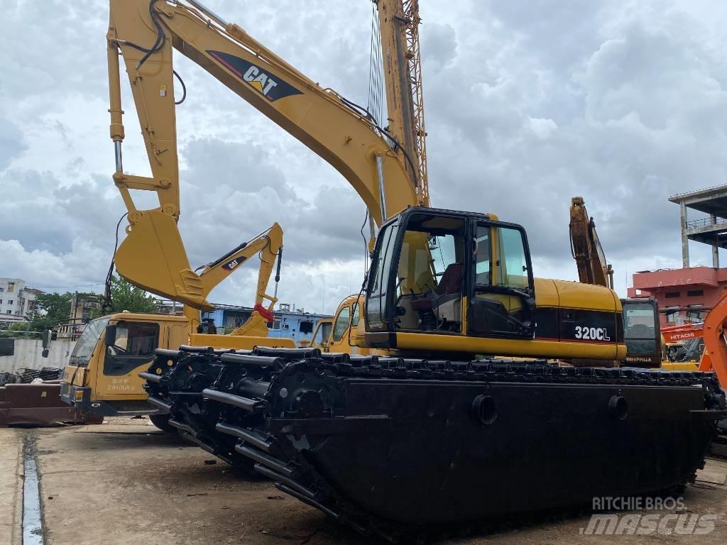 CAT 320 C Amfibiniai ekskavatoriai