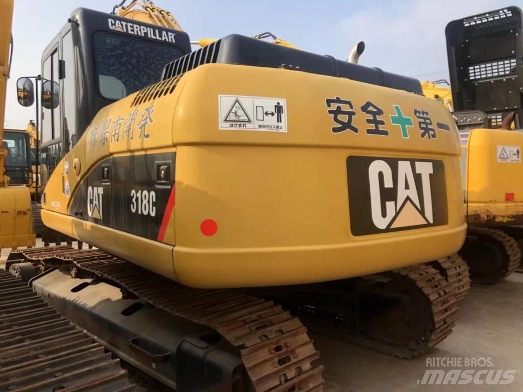 CAT 318C Vikšriniai ekskavatoriai