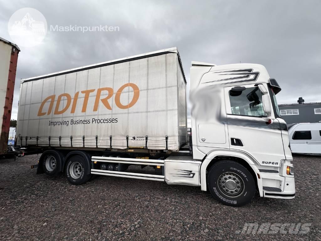Scania R 580 Konteinerių nuožulnaus pakėlimo ant platformos krautuvai