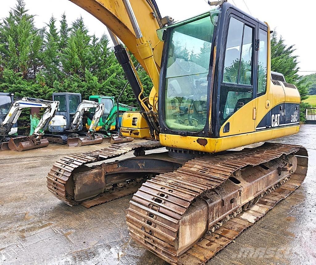 CAT 318 C Vikšriniai ekskavatoriai