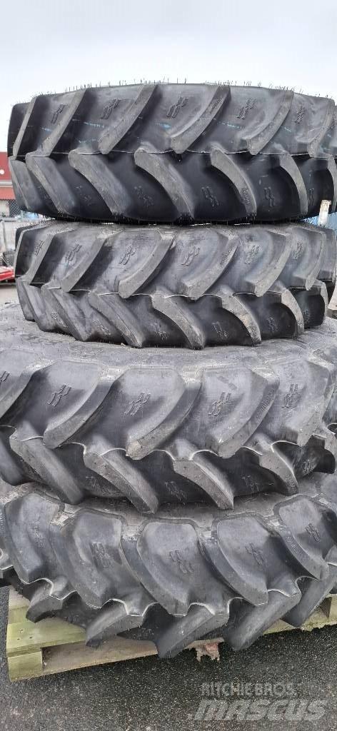 New Holland T5.110 Padangos, ratai ir ratlankiai