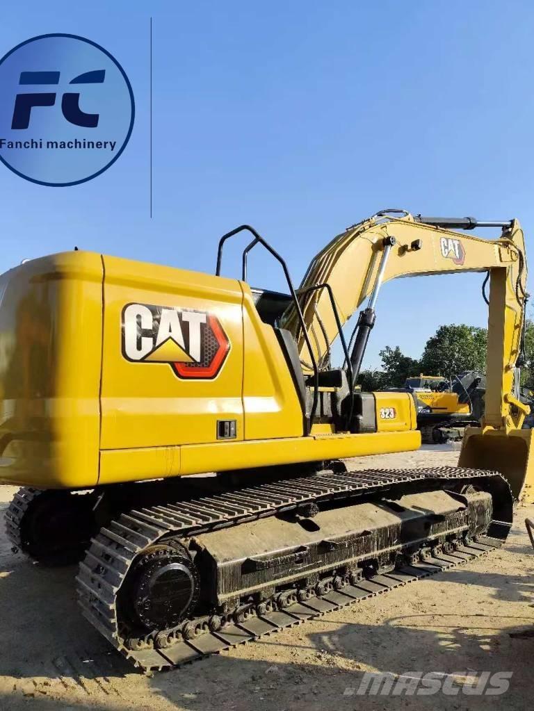 CAT 323 Vikšriniai ekskavatoriai